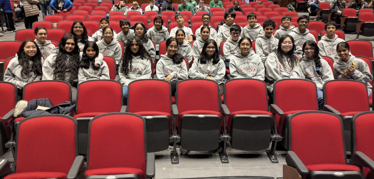 Team seated at a tournament